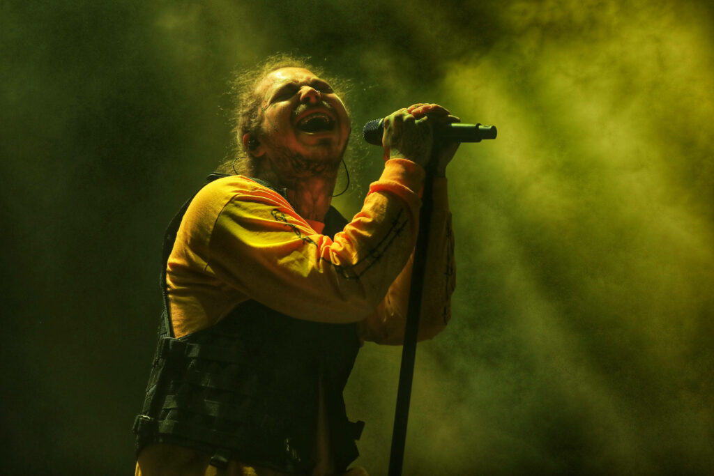 Post Malone Concert Wallpaper: Vibrant Stage Performance in Portland 2018