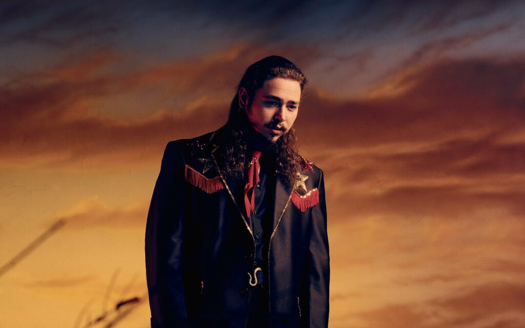 Searing Stages: Post Malone, the Melodic Maestro, Charms Fans Worldwide - Ultra HD Portrait of a Captivating Celebrity Wallpaper