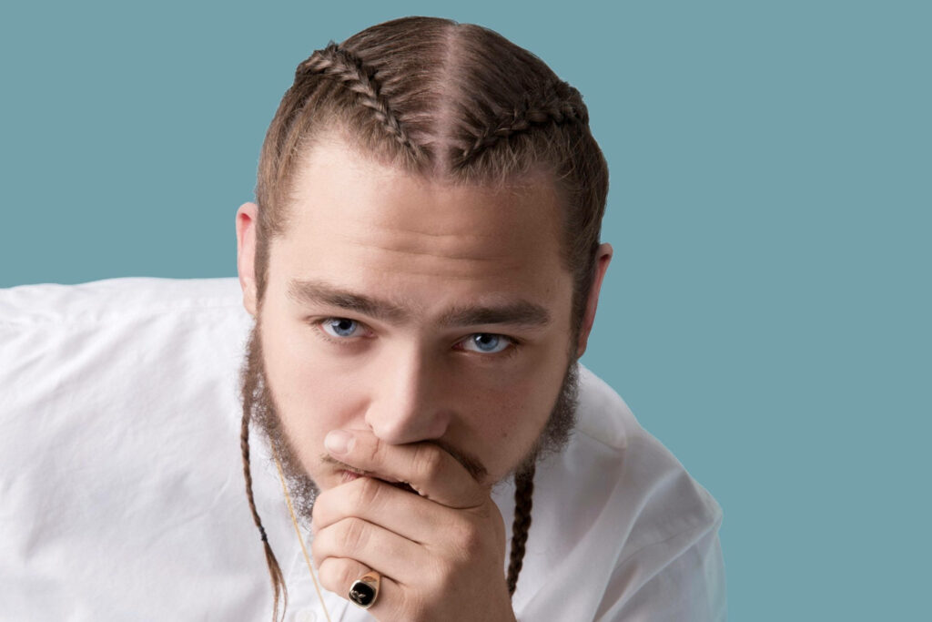 Minimalistic Post Malone Wallpaper: Braided Hairstyle & Blue Background