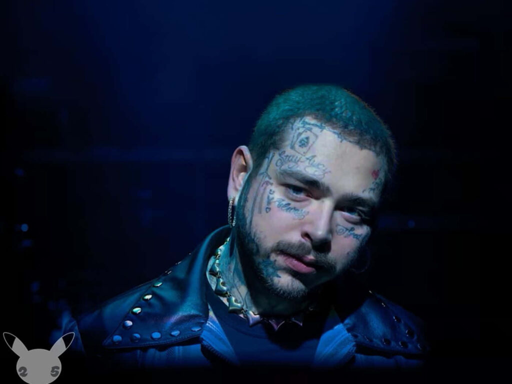 Post Malone Wallpaper: Iconic Style with Face Tattoos & Blue Background