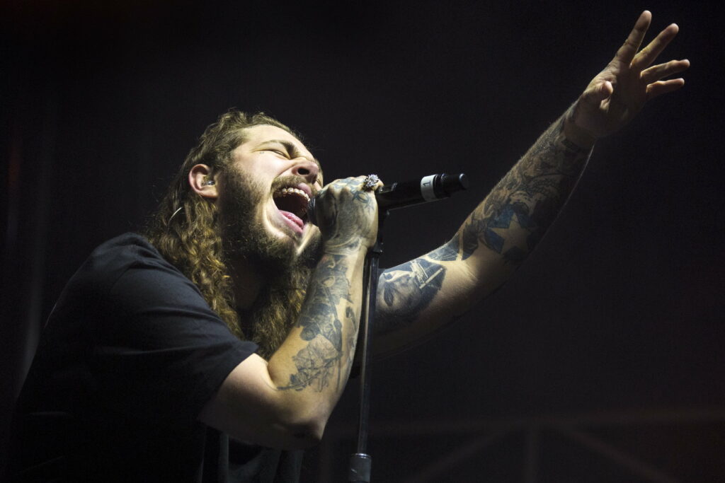 Explosive Live Performance by Post Malone: Mesmerizing 4K Wallpaper Background