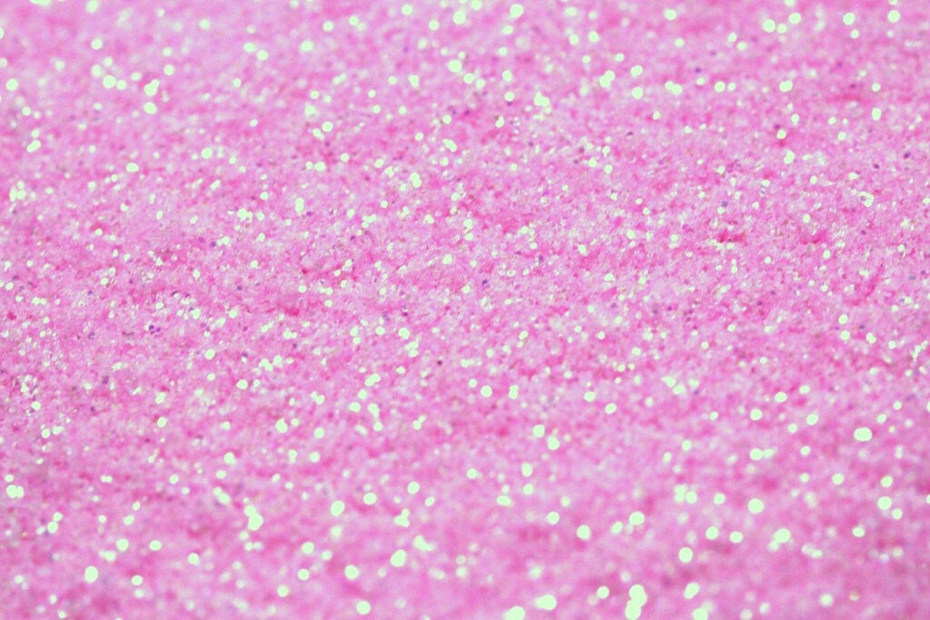 Sparkling Blush: A Pink Glitter and Powder Texture Wallpaper