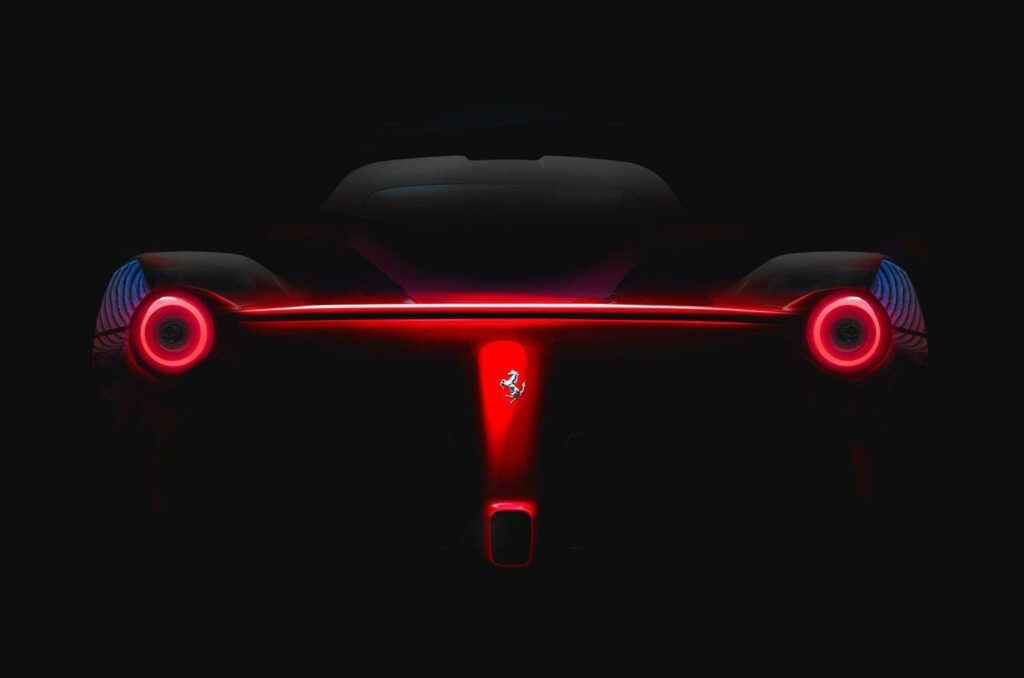 Speed and Elegance Unleashed: Laferrari Limited Edition Hybrid Sports Car Illuminated in Glowing Red with Iconic Silver Logo - Ferrari Desktop Background Wallpaper