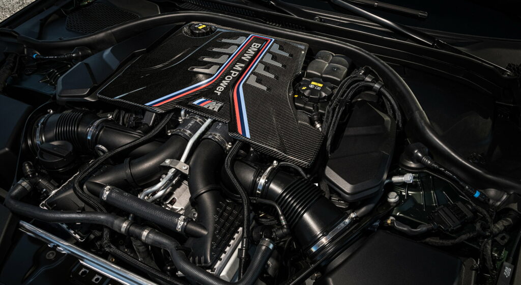 Powerful Performance Unleashed: 2022 BMW M5 CS Revs Up in Striking QHD Car Wallpaper