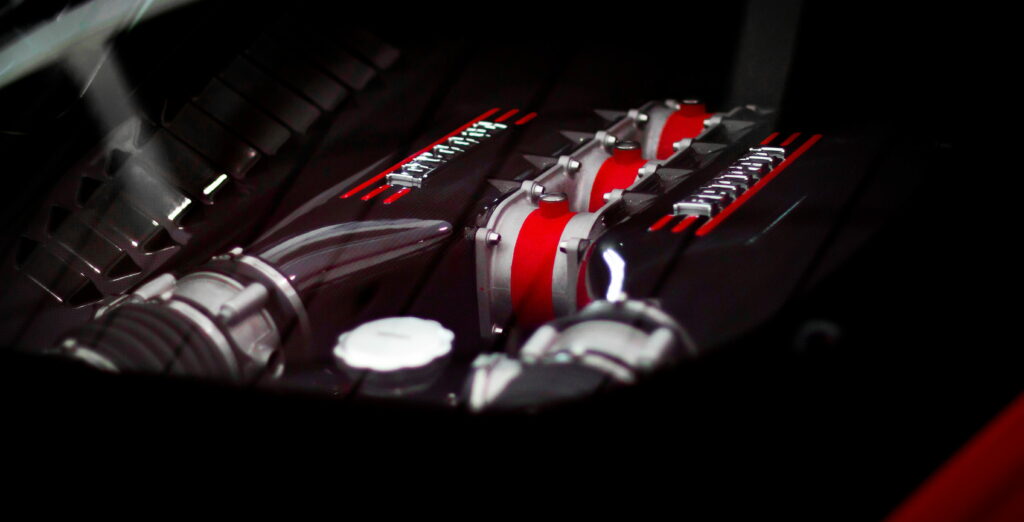 Ferrari 458 Speciale engine close-up in black and red high-contrast selective focus photo Wallpaper