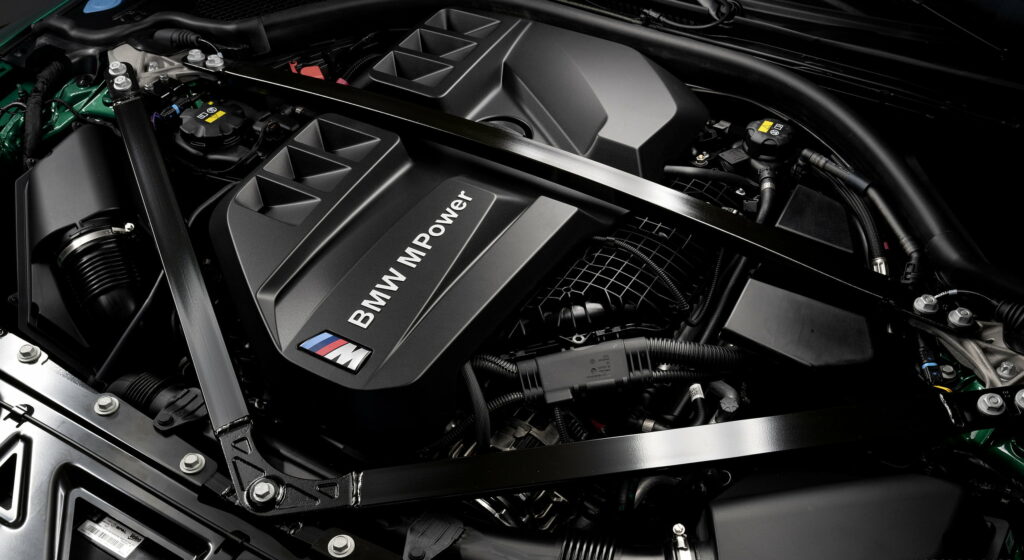 Power Unleashed: Captivating 2021 BMW M3 Sedan Engine in QHD Car Wallpaper