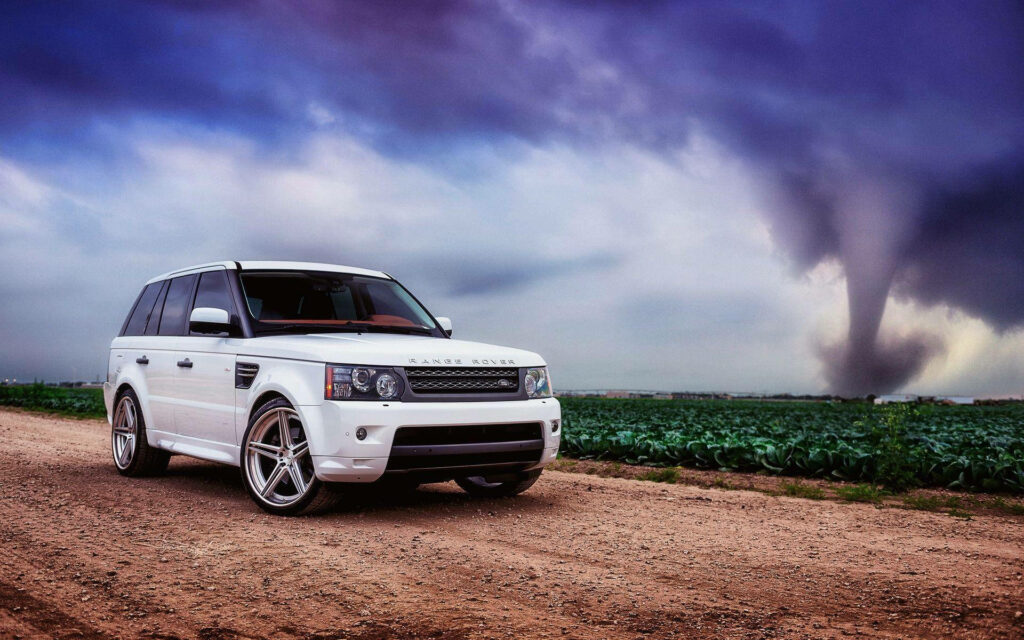 4K Wallpaper: Sleek White Range Rover vs. Stormy Sky & Twister