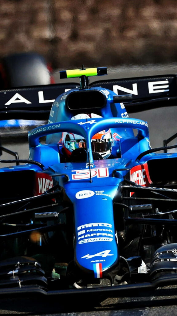 Stunning Alpine Race Car Wallpaper: Sleek Design & Aerodynamic Wing