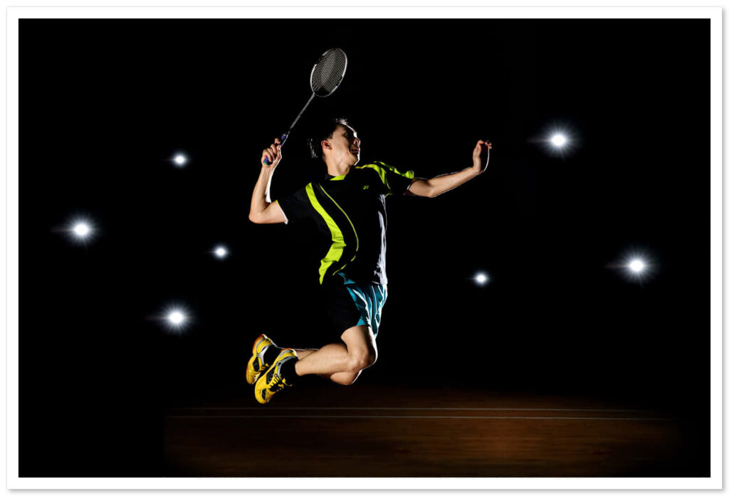 Badminton Player in Dark Black Background Wallpaper
