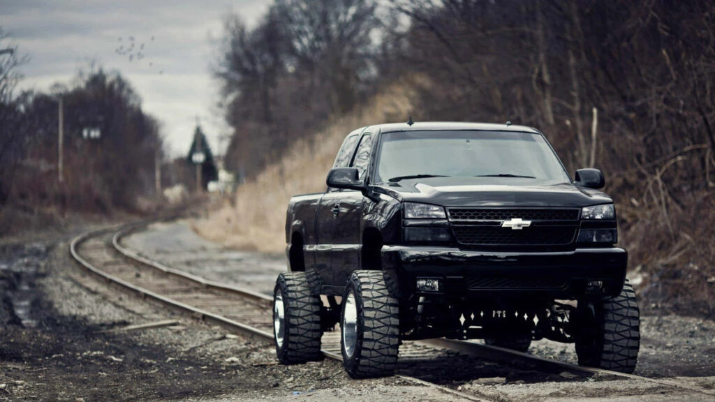 Bold Chevy Silverado 1500 Wallpaper: Off-Road Power in Nature