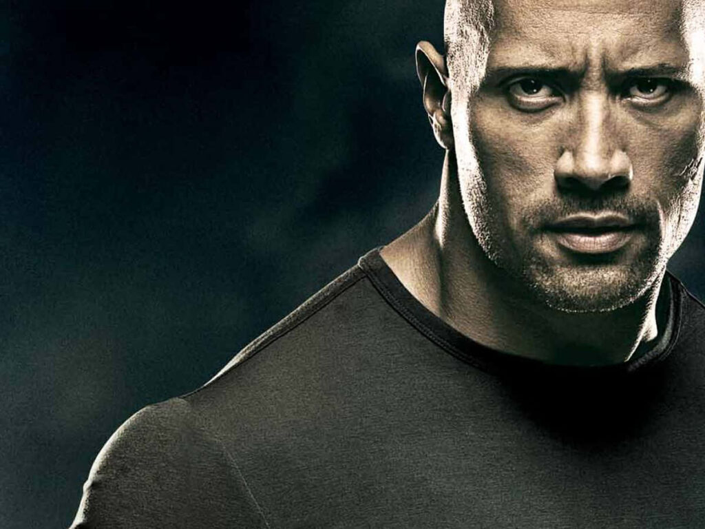 Powerful Dwayne Johnson Wallpaper in Black Project Rock Shirt