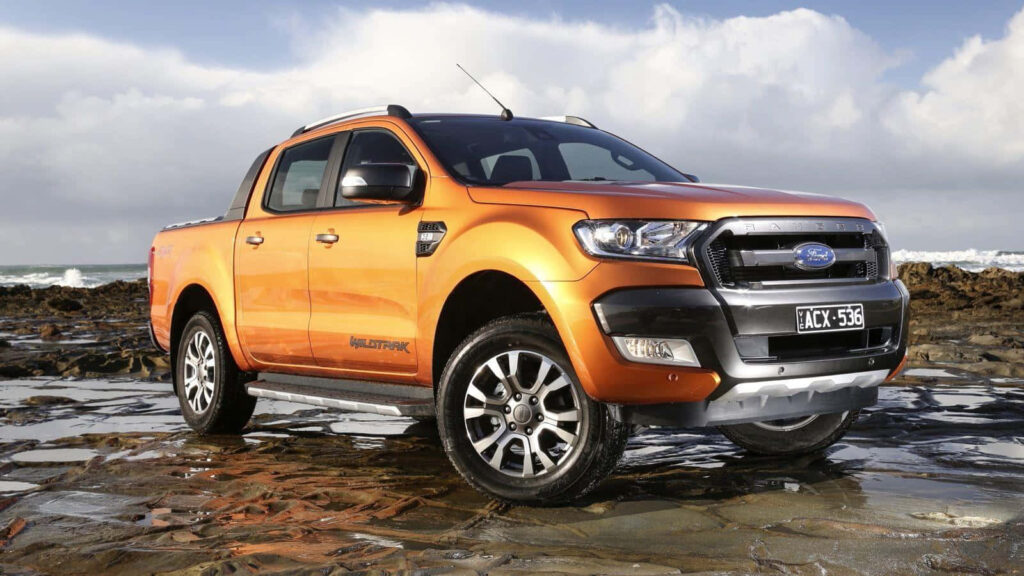 Ford Ranger bold truck on rugged terrain showcasing powerful design adventure-ready wallpaper