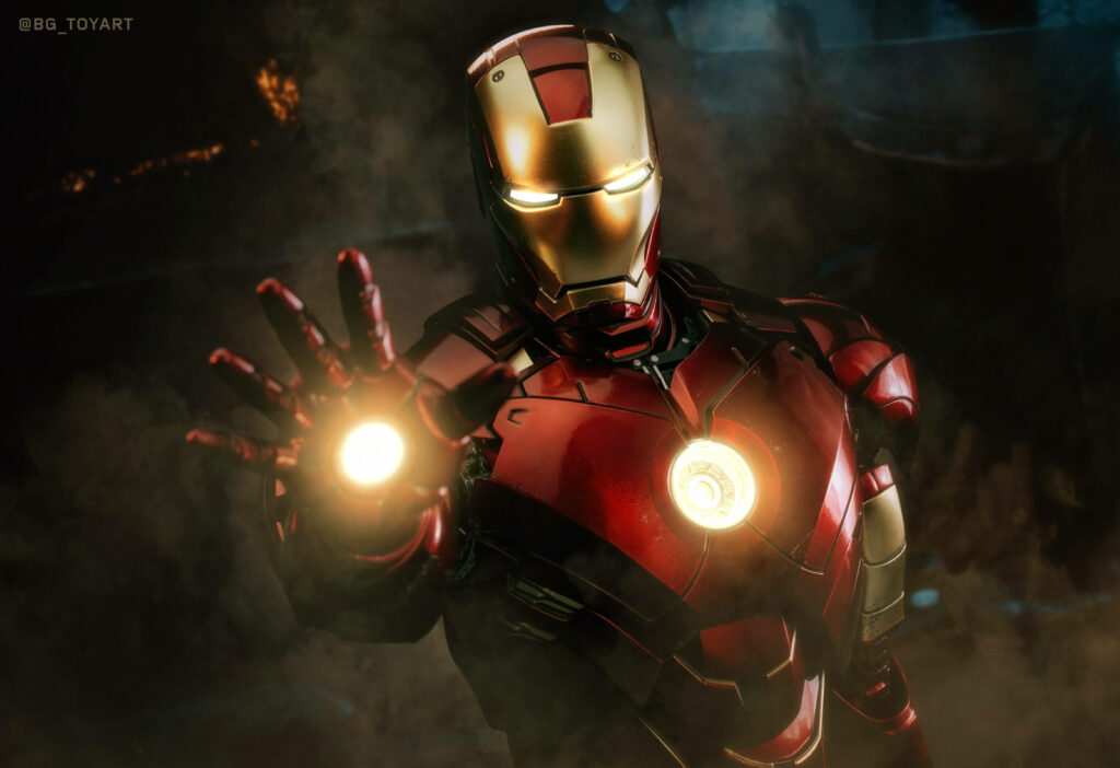 Powerful Iron Man Unleashing His Superhero Abilities in a Stunning Dark Background - A Striking HD Marvel Wallpaper