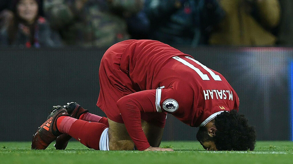 Mohamed Salah Humble Wallpaper: Football Field Gratitude Background