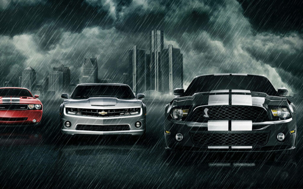 Powerful Muscle Cars in Rain: Dramatic City Skyline Wallpaper