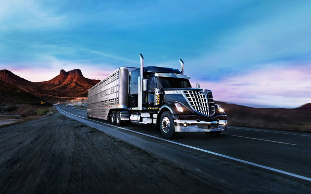 Powerful International Lone Star Truck Roaming the Open Road as a Striking QHD Wallpaper