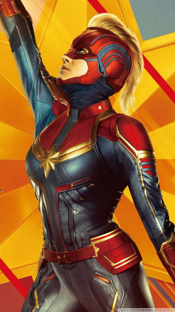 Courageous Carol Danvers Embracing Her Mighty Superhero Persona Wallpaper