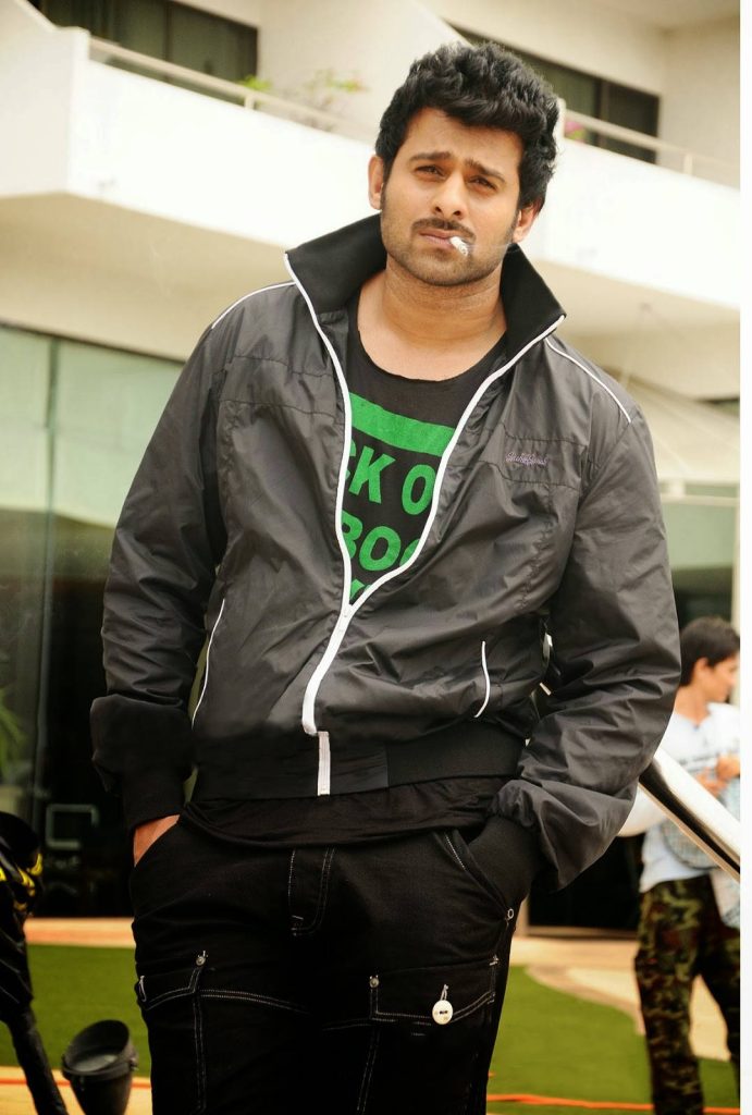 Prabhas in black jacket from Darling movie intense look stylish casual wallpaper background