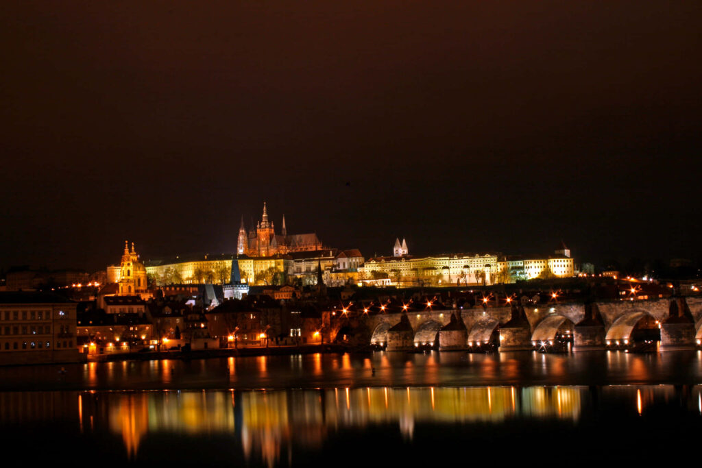 Stunning Prague Castle Night View: Illuminated Reflections Wallpaper