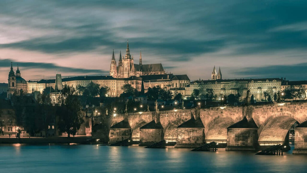 Majestic Prague Castle at Night - Vintage Wallpaper Background