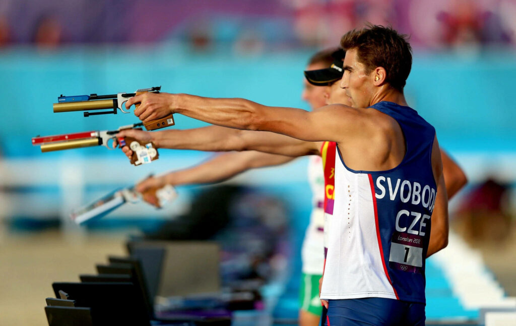 Modern Pentathlon Athletes in Pistol Shooting - Wallpaper Background