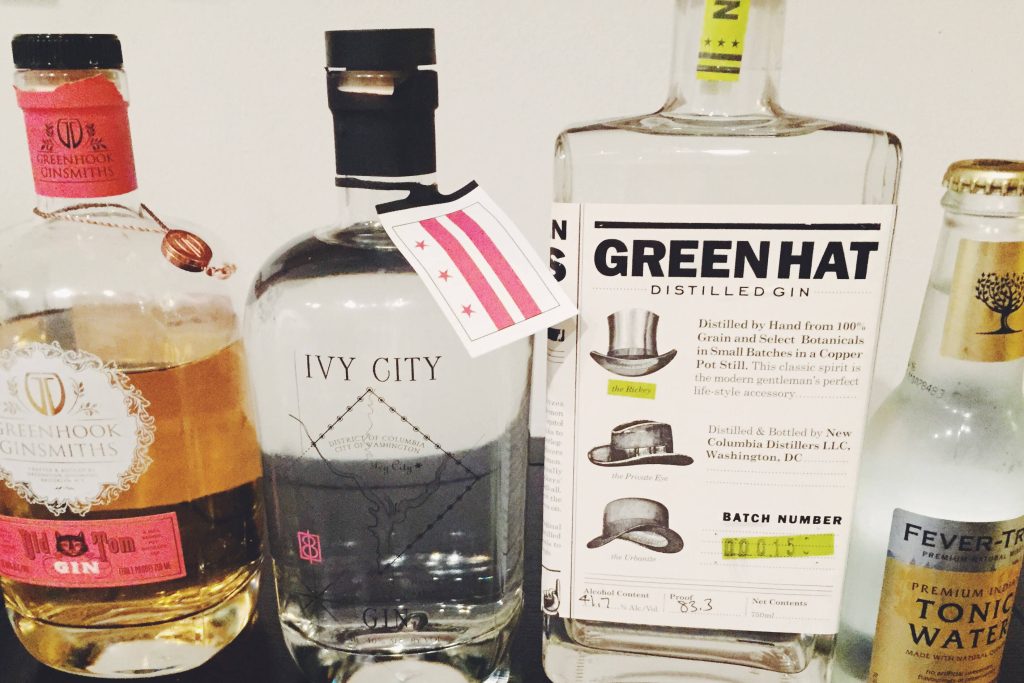 Premium gin and tonic setup with Greenhook Old Tom Gin Green Hat Ivy City Gin tonic water Wallpaper