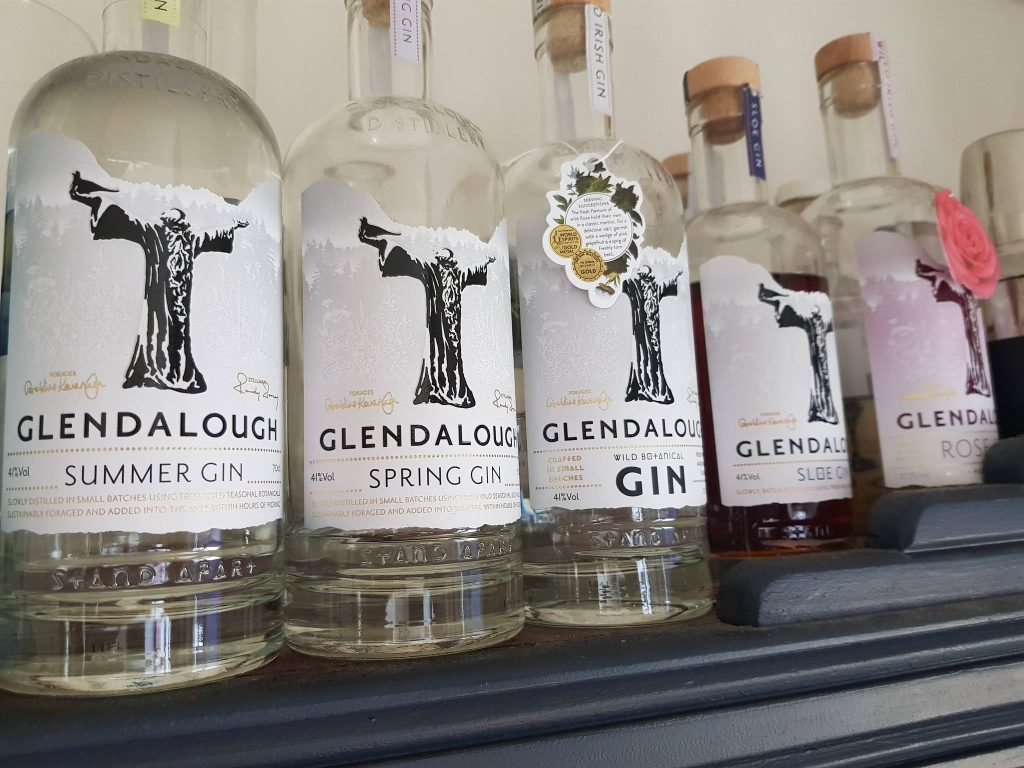Glendalough Distillery premium gin lineup with Summer Spring Wild Botanical Sloe and Rose bottles Wallpaper