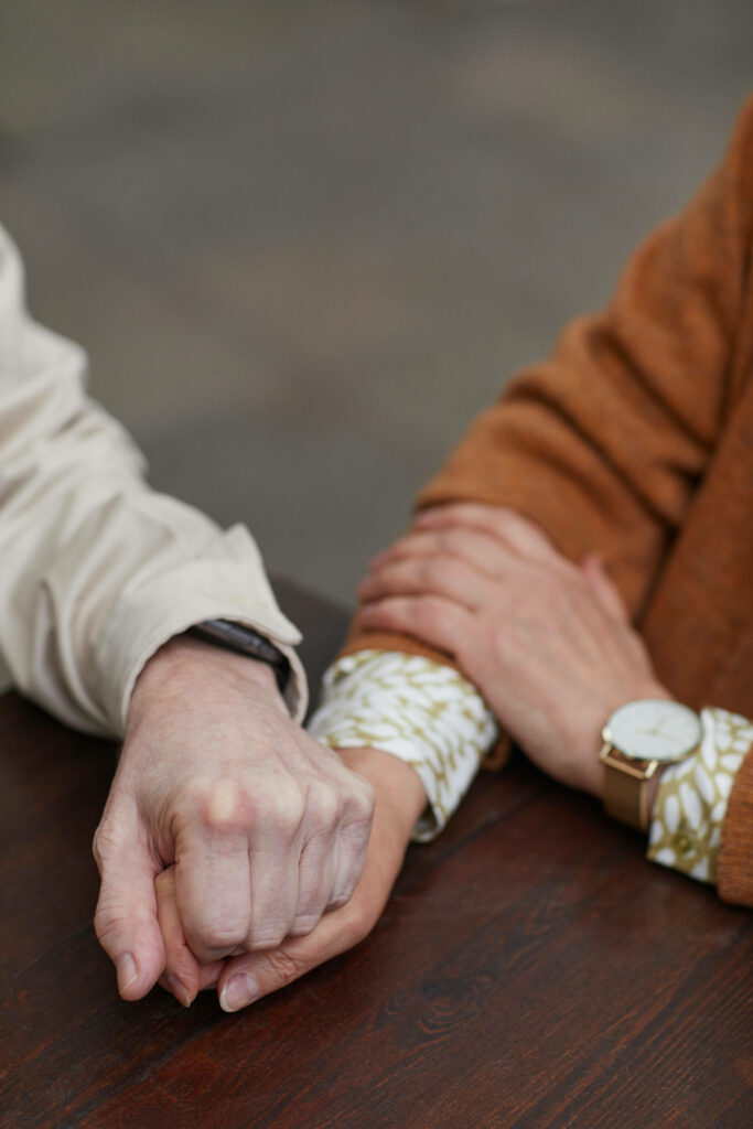Capturing the Preppy Vibes: Outdoor Portrait of a Stylish Couple Embracing their Love Wallpaper