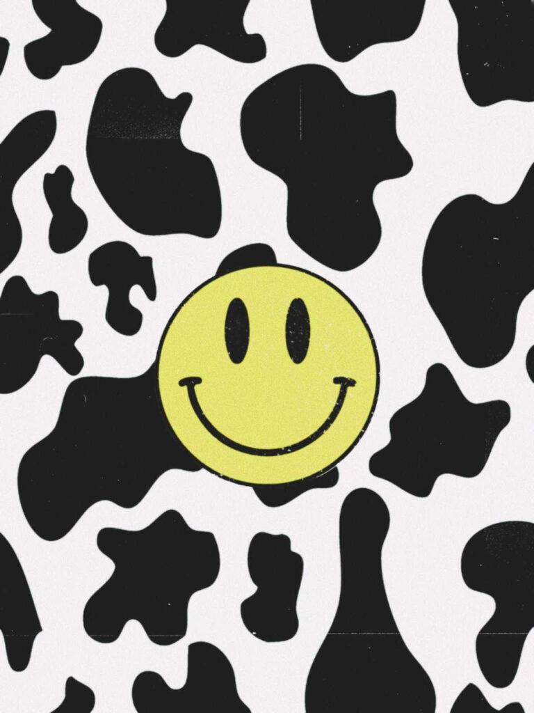 Sunshine in a Cow Print: Preppy Smiley Face Shines Bright on a Monochrome Canvas Wallpaper