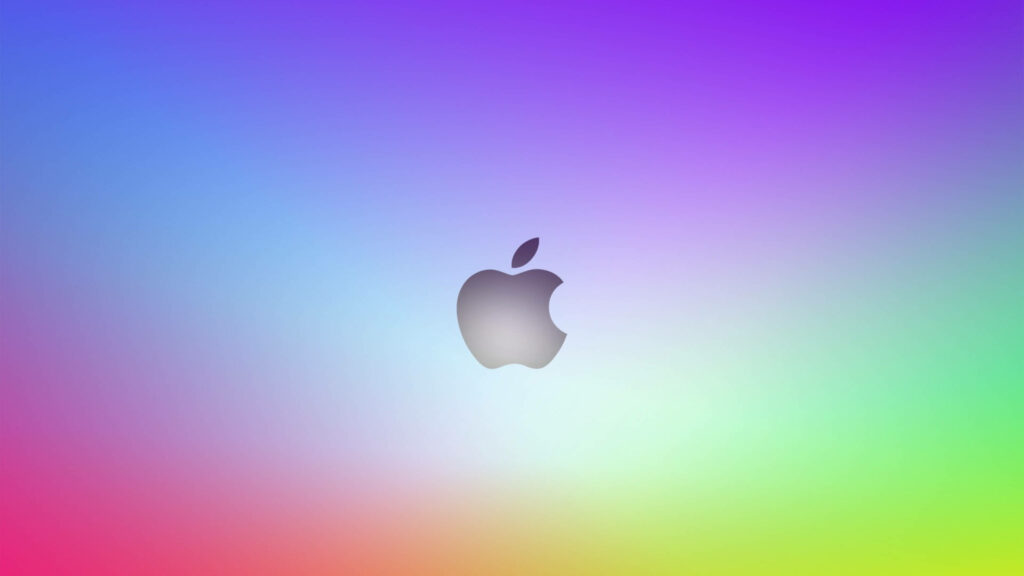 Prismatic Brilliance: Apple's Gray Embossed Logo in a Resplendent Soft Light Wallpaper