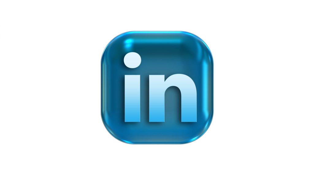 Glossy blue 3D LinkedIn logo with realistic lighting on white background wallpaper design