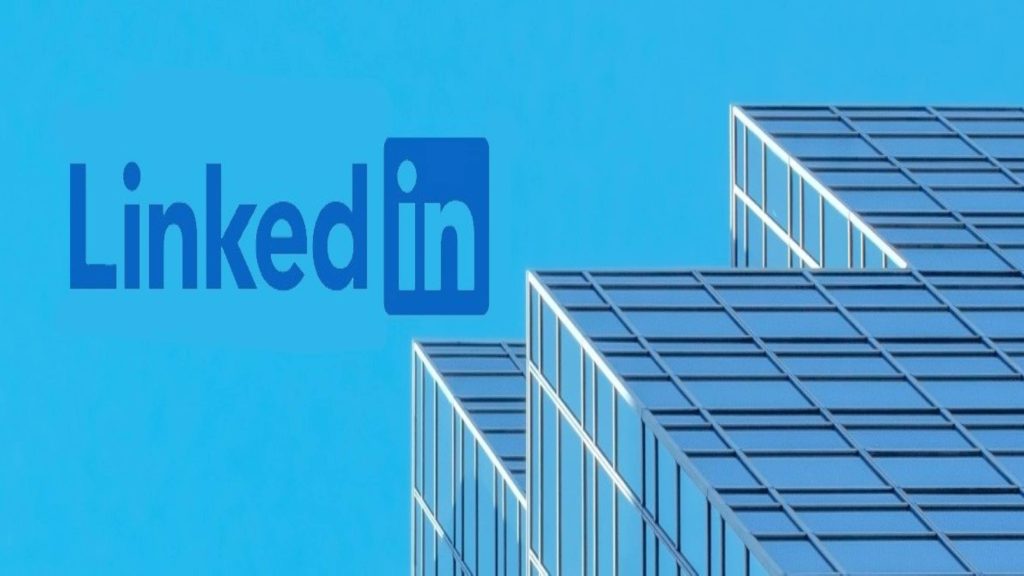 LinkedIn logo on blue sky with modern glass skyscraper minimalist professional wallpaper background