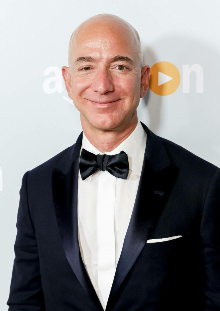 Jeff Bezos Portrait in Suit with Amazon Logo Wallpaper Background
