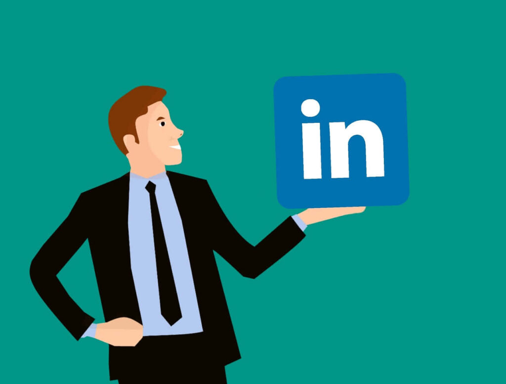 Professional Success Wallpaper: Confident Figure with LinkedIn Logo