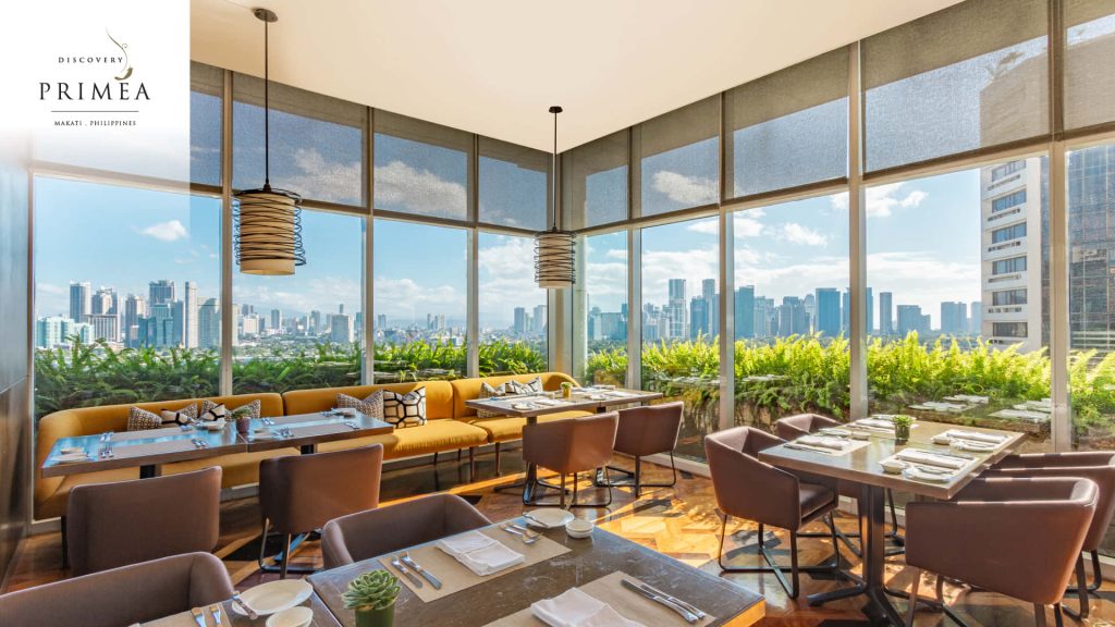 Zoom background of Discovery Primea restaurant Makati city skyline warm lighting stylish decor Wallpaper