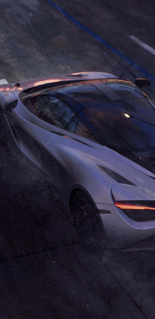 Sleek sports car speeding on rain-soaked race track Project Cars 2 realistic racing wallpaper