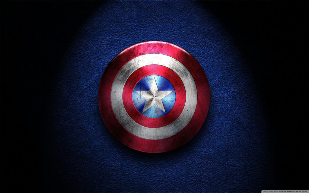 Marvelous Patriotism: Display Captain America's iconic logo on this stunning blue leather wall Wallpaper