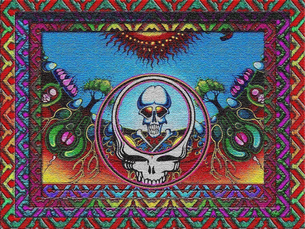 Psychedelic Grateful Dead Steal Your Face skull with neon colors and geometric trippy landscape Wallpaper