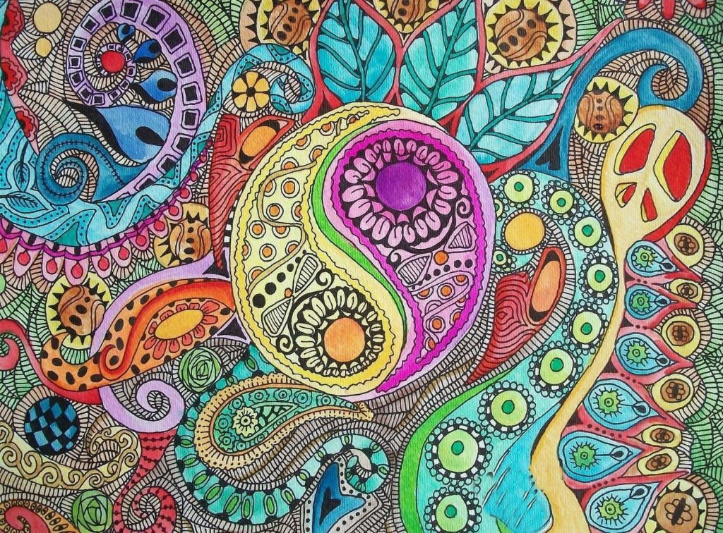 Vibrant hand-drawn psychedelic doodle wallpaper with yin-yang and peace sign hippie patterns