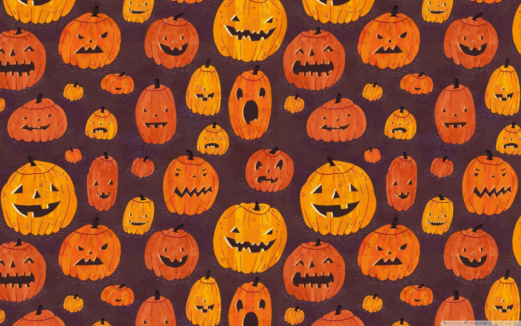 Pumpkin Patch Delight: Playful Halloween Patterns on a Charming Brownish-Purple Canvas Wallpaper