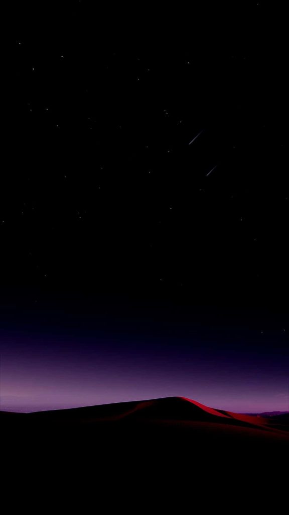 Pure black OLED wallpaper with minimalist red-lit desert dune and starry night sky background