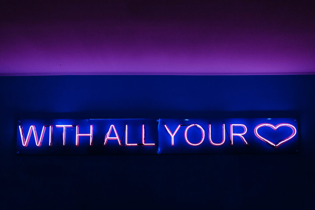 Purple Illumination: Mesmerizing 4k Neon Sign Glows 'With All Your ♥' Wallpaper