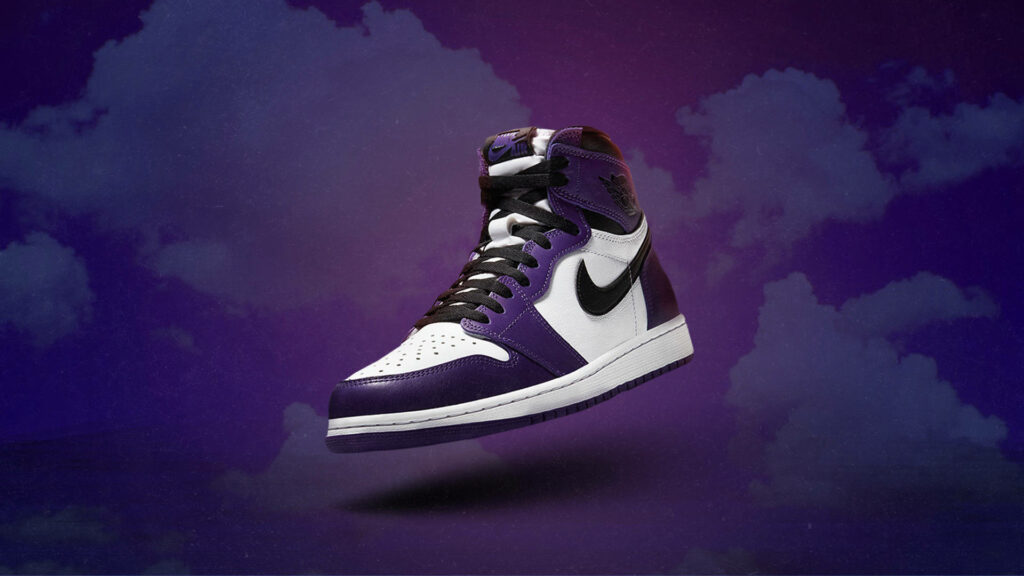 Purple Majesty: Nike's Iconic Michael Jordan Shoe with Striking Coolness Wallpaper