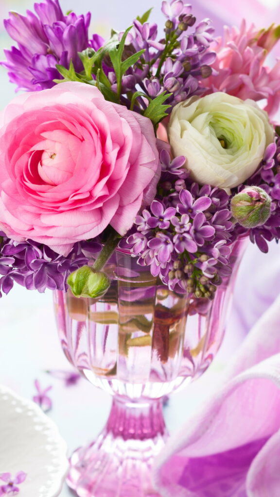 Blooming Beauties: Vibrant Lilacs and Ranunculas in Stunning Shades of Pink and Purple – Captivating Spring HD Phone Wallpaper
