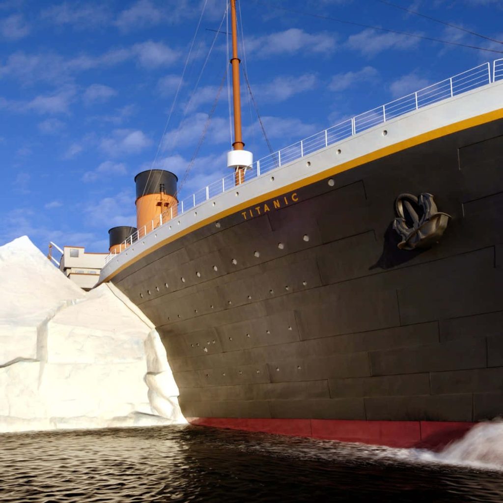 RMS Titanic Museum replica bow with iceberg vivid sky educational history wallpaper background