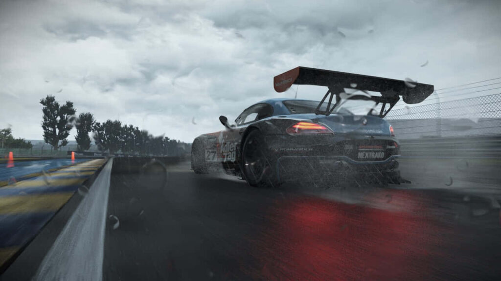 Race car speeding on wet foggy track with water droplets dynamic immersive Project Cars wallpaper