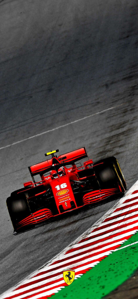 Thrilling Capture: Red-hot Scuderia Ferrari Speeds in Formula 1 - Ideal for a Ferrari Phone Theme! Wallpaper