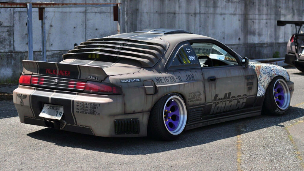 Revved Up: A Stance JDM Race Car Sets the Pulse Racing in an Urban Wilderness - JDM Stance Background Wallpaper