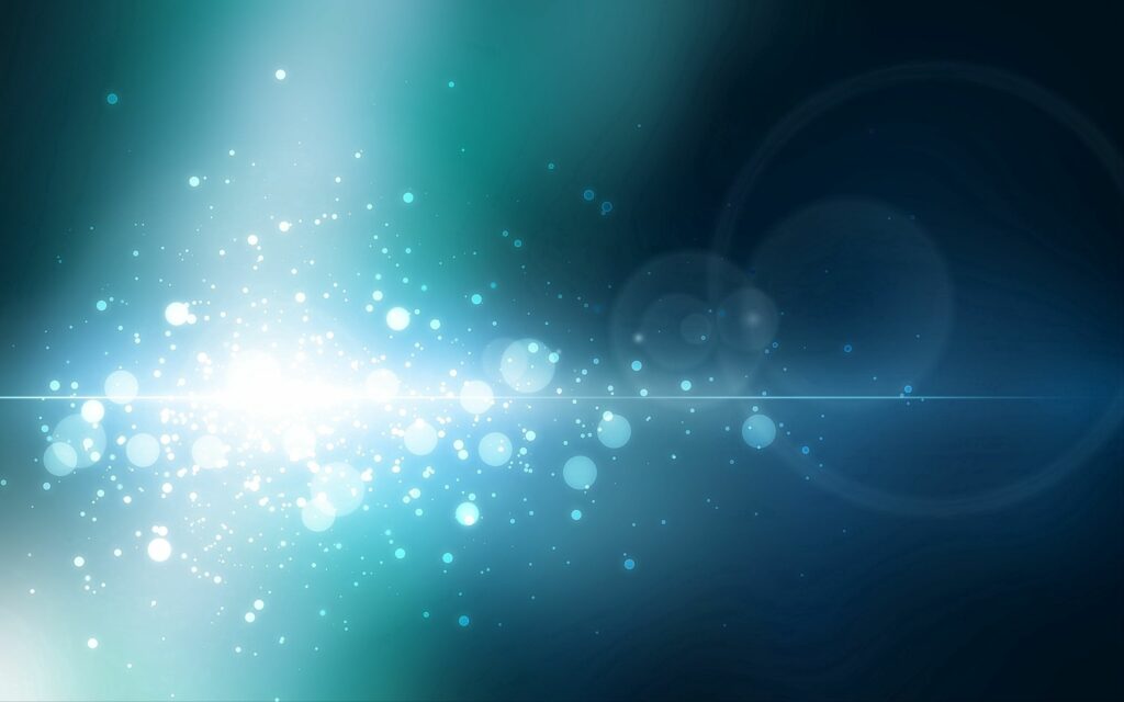 Radiant Abstract Wallpaper: Glowing Orbs & Glittering Particles