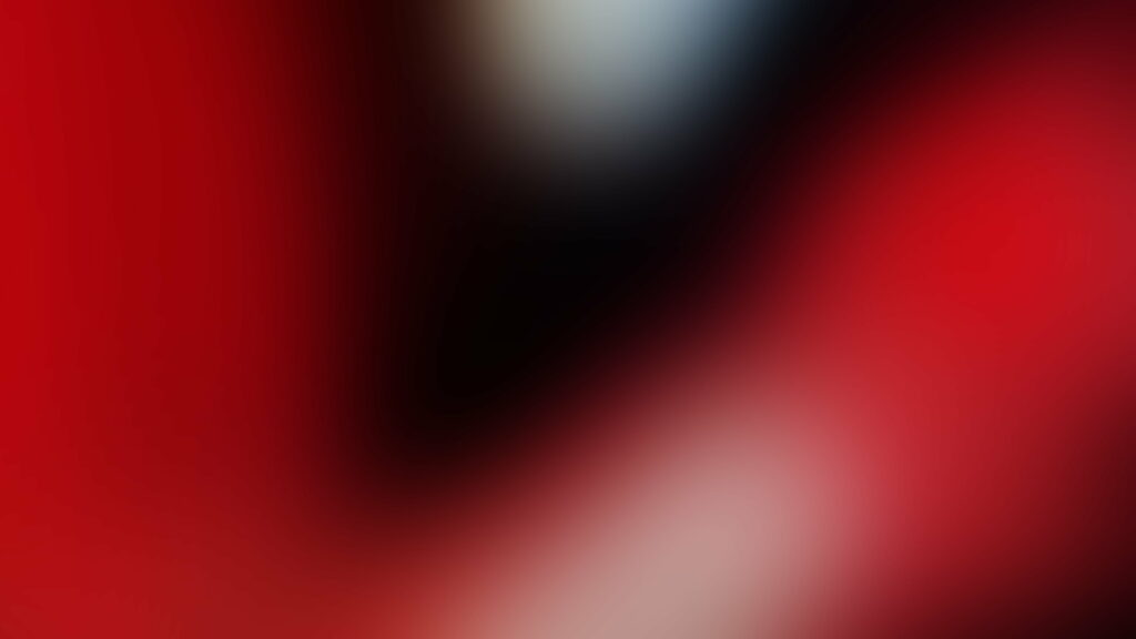 Vibrant Crimson Abstraction: Mesmerizing Red Blur in 4K Wallpaper